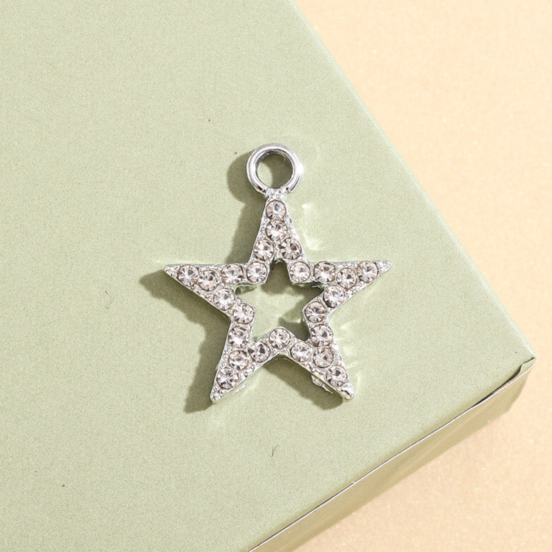 Hollow zircon star charm