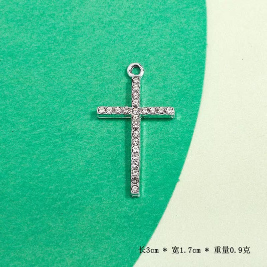 Zircon Cross Charm