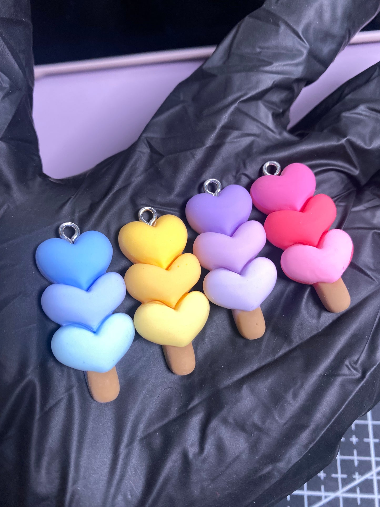 Triple heart charm