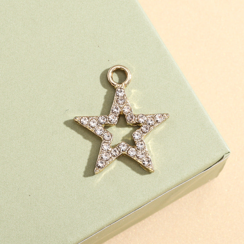 Hollow zircon star charm