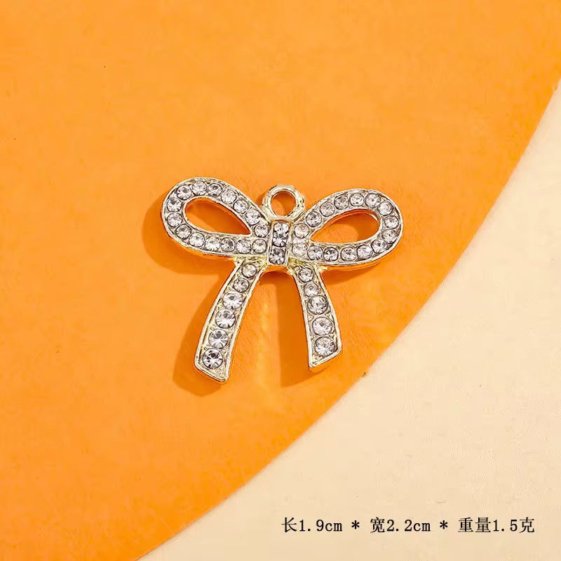 Zircon Ribbon Charm
